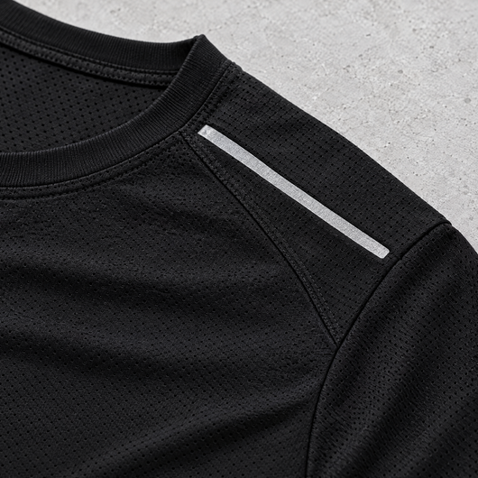 Close-up of the shoulder seam and reflective detail