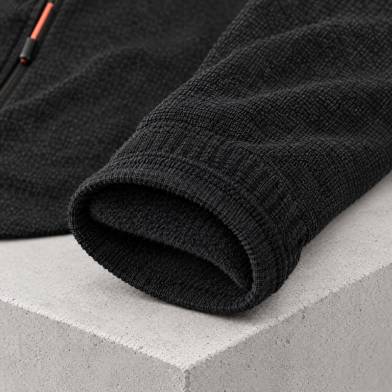 Close-up of the sleeve cuff and brushed knit