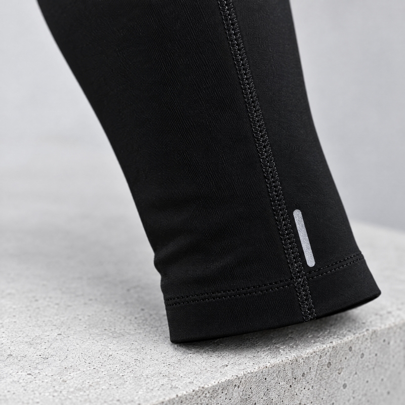 Close-up of the tights ankle with reflective detail