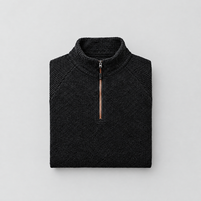 The half-zip running top laid out flat