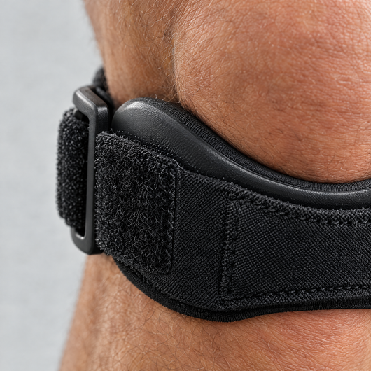 Close-up detail of the patella knee strap