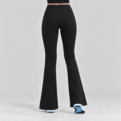 Black fleece-lined flared tights seen from behind