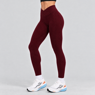 Woman wearing the wine red seamless running tights