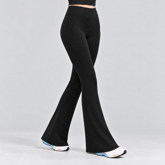 Woman wearing the black fleece-lined flared tights