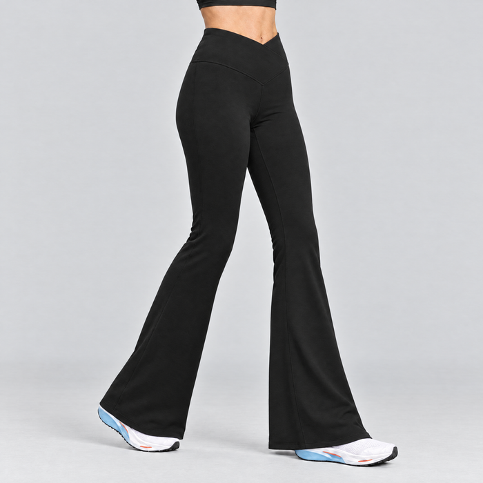 Woman wearing the black flared running tights